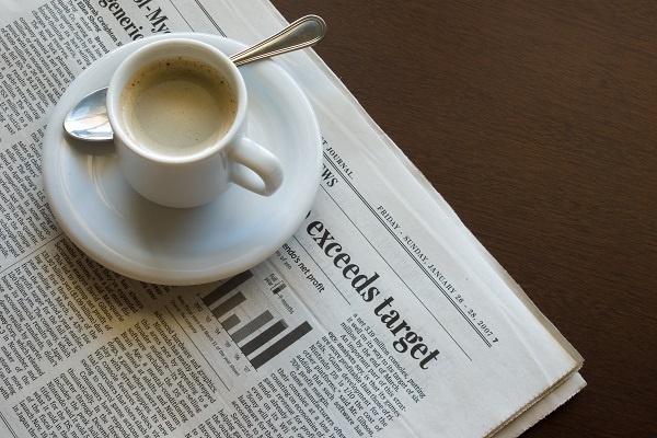 event_meeting_newspaper_with_coffee_cup_sitting_on_it event_meeting_newspaper_with_coffee_cup_sitting_on_it