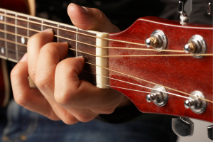 music-guitar-being-played-closeup-1