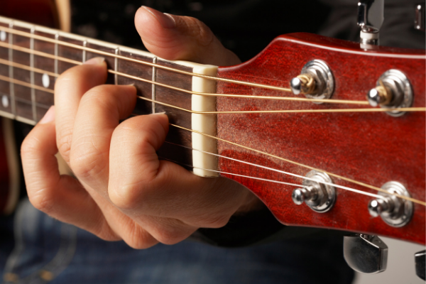 music-guitar-being-played-closeup-3